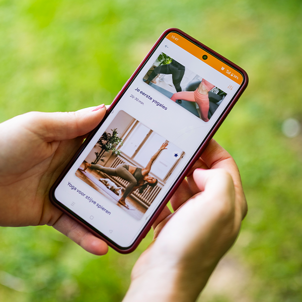 Een gsm toont de Vity-app
